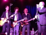 R.E.M. carefully avoids actual reunion as all 4 members play Peter Buck’s wedding