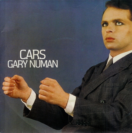 Video: Gary Numan plays ‘Cars’ on 24 actual cars in new DieHard battery commercial