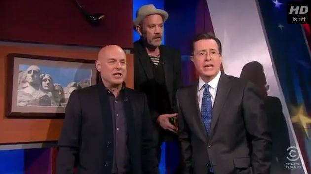 Video: R.E.M.’s Michael Stipe, Brian Eno and Stephen Colbert sing ‘Lean on Me’