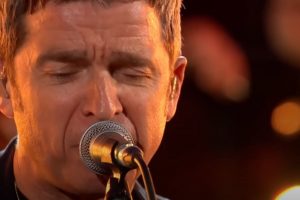Watch: Noel Gallagher covers Joy Division’s “Love Will Tear Us Apart” with BBC orchestra